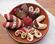 Gathering Hearts patchwork quilt pattern by Norma Whaley